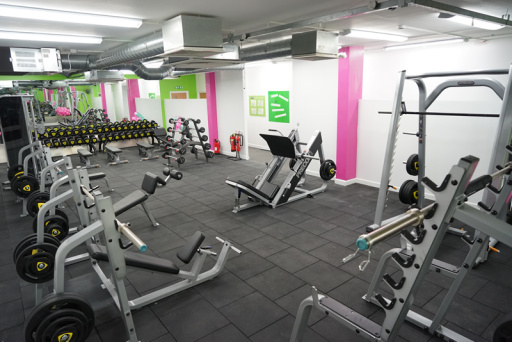 The large free weights area in our gym with all dumbells and strength machines you need