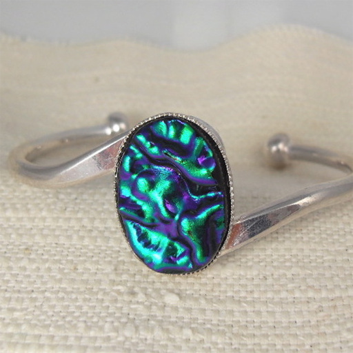 Teal coloured dichroci glass bangle