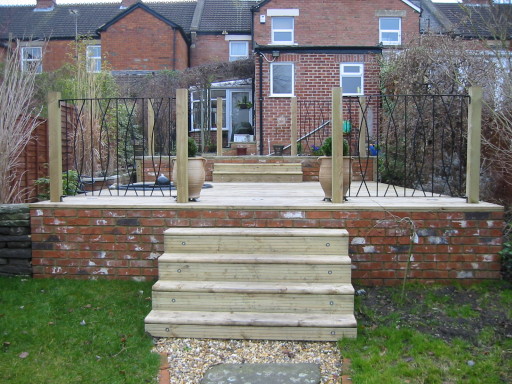 Landscape gardeners Chippenham Wiltshire,Decking with pond &amp; patio project