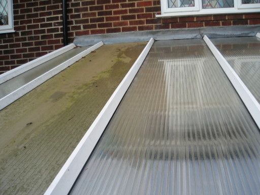 Cleaning polycarbonate roof, from green to clean