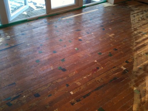 Reclaimed beech floor prior to sanding.