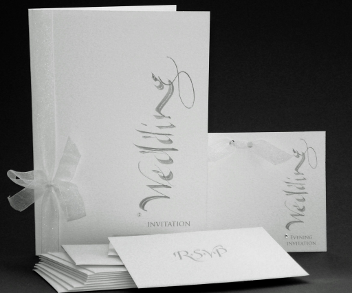 Contemporary calligraphic artwork printed onto these invitations give a sophisticated look