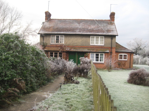 The self catering holiday cottage in the frost.