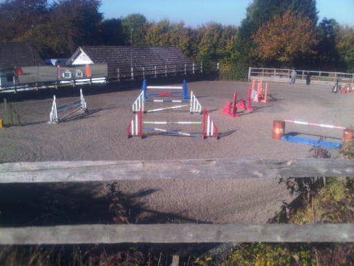 Large floodlit sand/rubber arena with mirrors!
