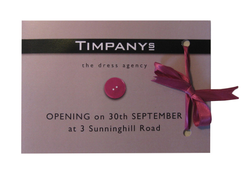 Marketing campaign mailer for luxury dress shop launch