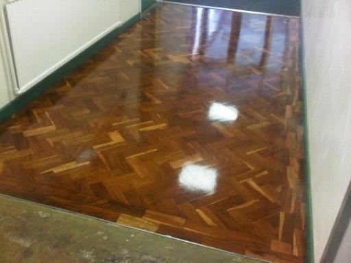 Iroko parquet herringbone floor sanding