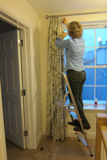 Hanging curtains! lovely clock fabric available through Boxhouse Interiors