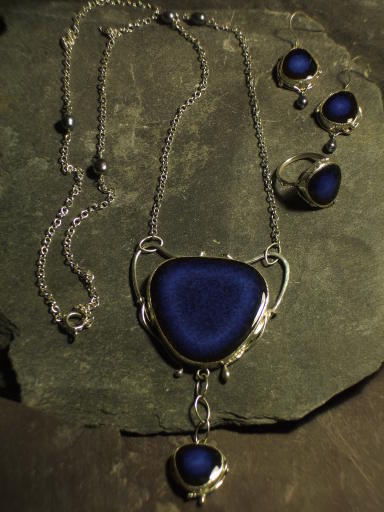 Sterling silver and blue ceramic flapper necklace with matching ring and earrings from 'Hark'