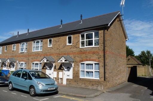 Two bedroom end-of-terrace house with private car park.