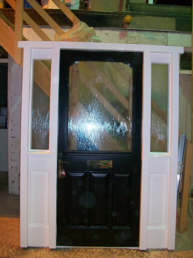 Solid wood door. frame with side lights