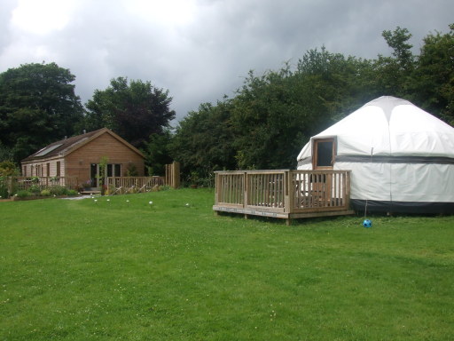 Yurt and barn with contemporary fitted kitchen and Shower Rooms