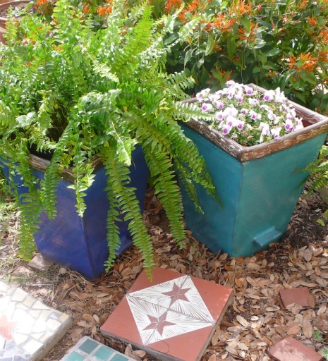 Ceramic planters and stepping stones made and fired in our studio