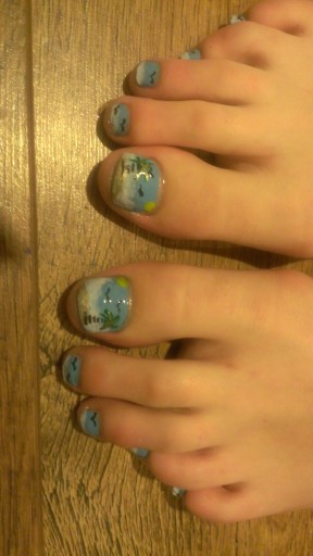 Pedicure with nail art.......beach scene
