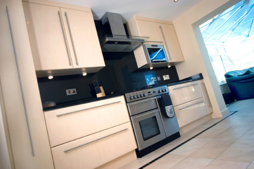 Bespoke Kitchen in a high gloss wood grain