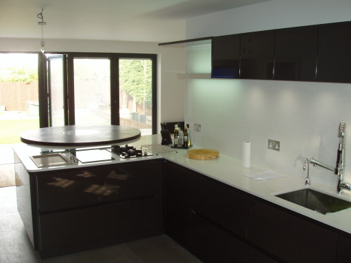 Modern Schuller Nextline Lacquered, handleless kitchen, Quartz worktops, ATAG apps, Designed by us