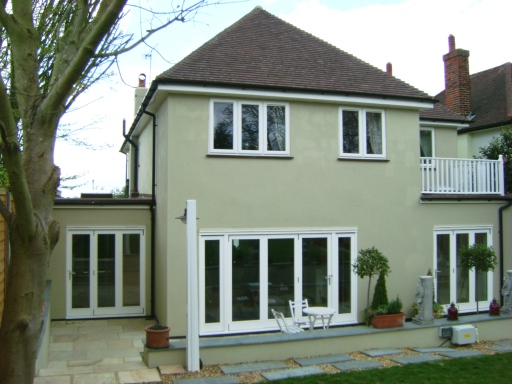 Rendered and sprayed with wall coating