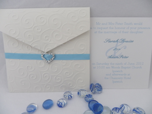 Blue embossed wallet invitation