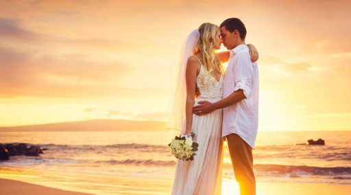 Bride and groom at sunrise