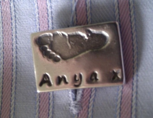 Footprint cufflink