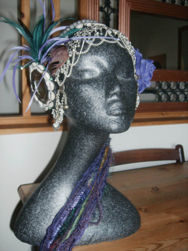 one-off purple and green headdress