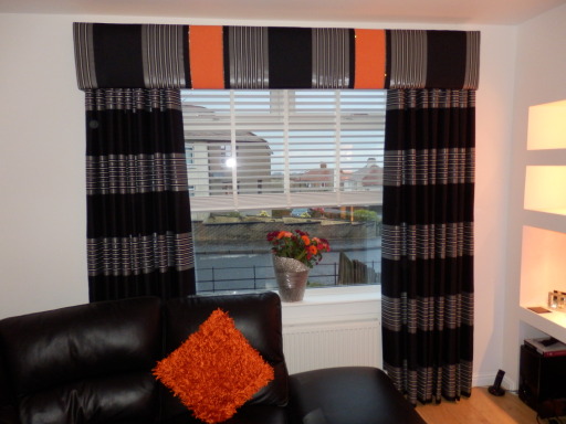 Beautiful curtains and pelmet in modern stripe fabric.