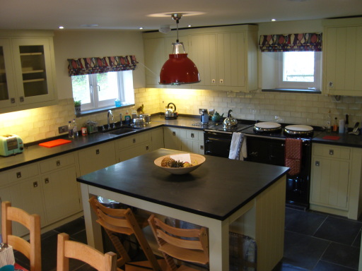 Character kitchens. Bespoke hand crafted kitchen with Zimbabwe black worktop