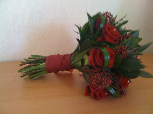 Red Rose Wedding Bouquet bound with red ribbon
