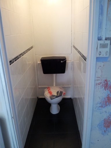 walls and floor tiled by me