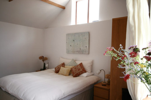 Superking size bed with Egyptian cotton bedding