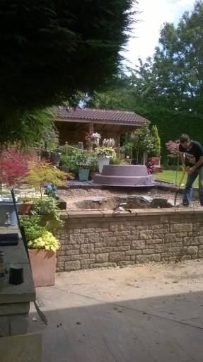 hole for pond taking shape