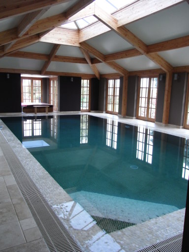 Indoor swimming pool with mosaic tile finish