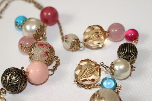 a collection of vintage floral and crystal beads. romantic