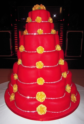 Chocolate 7 Tiered Red and Gold Asian Wedding Cake with Diamant?? bands