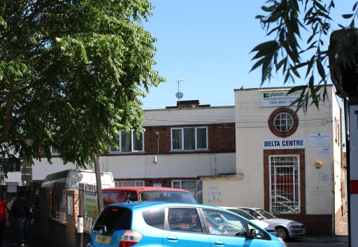Wider view of the Delta Centre building where Peleka is located also showing a car park for clients.
