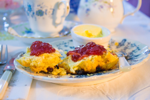 Delicious homemade scones with clotted cream and strawberry jam