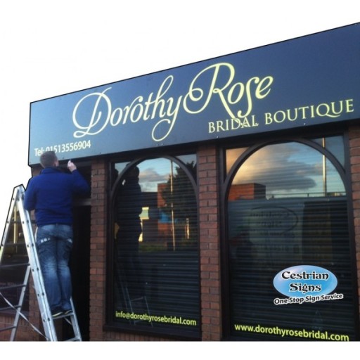 A simple shop fascia with cut gold lettering