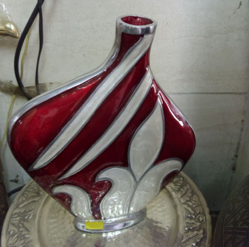 Hand-made and decorated recycled aluminium asymmetric 17" vase