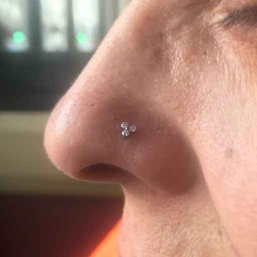 Nose piercing by Mara