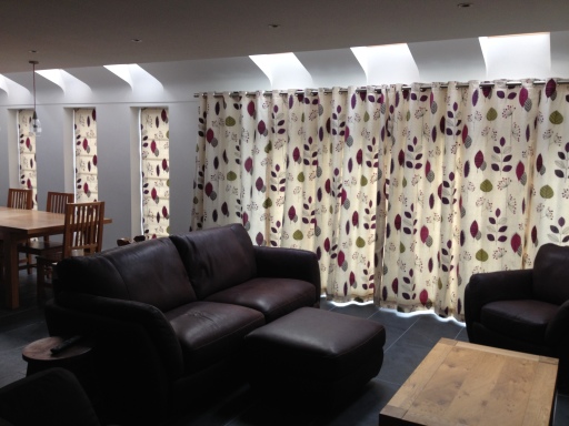 Eyelet curtains and roman blinds