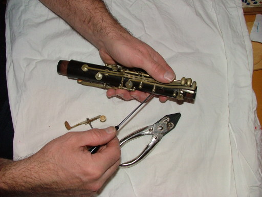 Woodwind repair. Removing keys