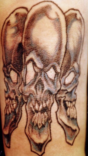 skulls tattoo by Doc