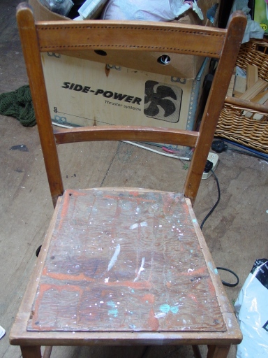 Caned chair before restoration