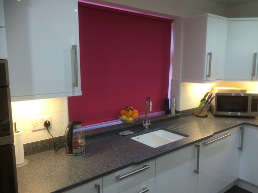Mistral worksurface with White High Gloss doors