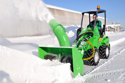 Avant Snow Blower clearing deep snow
