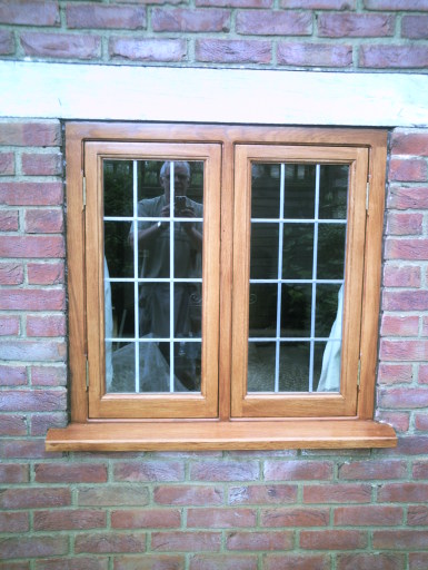 oak window with leaded double glazed unit