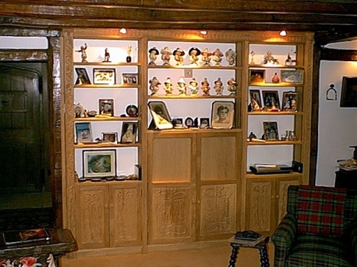 Bespoke Oak Bookcase and T.V.unit with carved Linenfold panels.