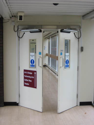 Automatic swing door pair
