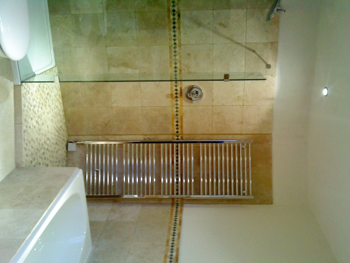Travertine, contempory bathroom installation