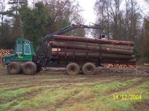 Timberjack 1210 Forwarder extracting 24ft Larch Logs