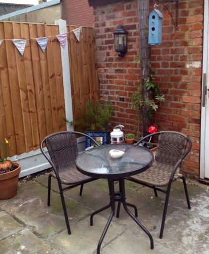 Suzie's sun-trap courtyard is perfect for al fresco dining.